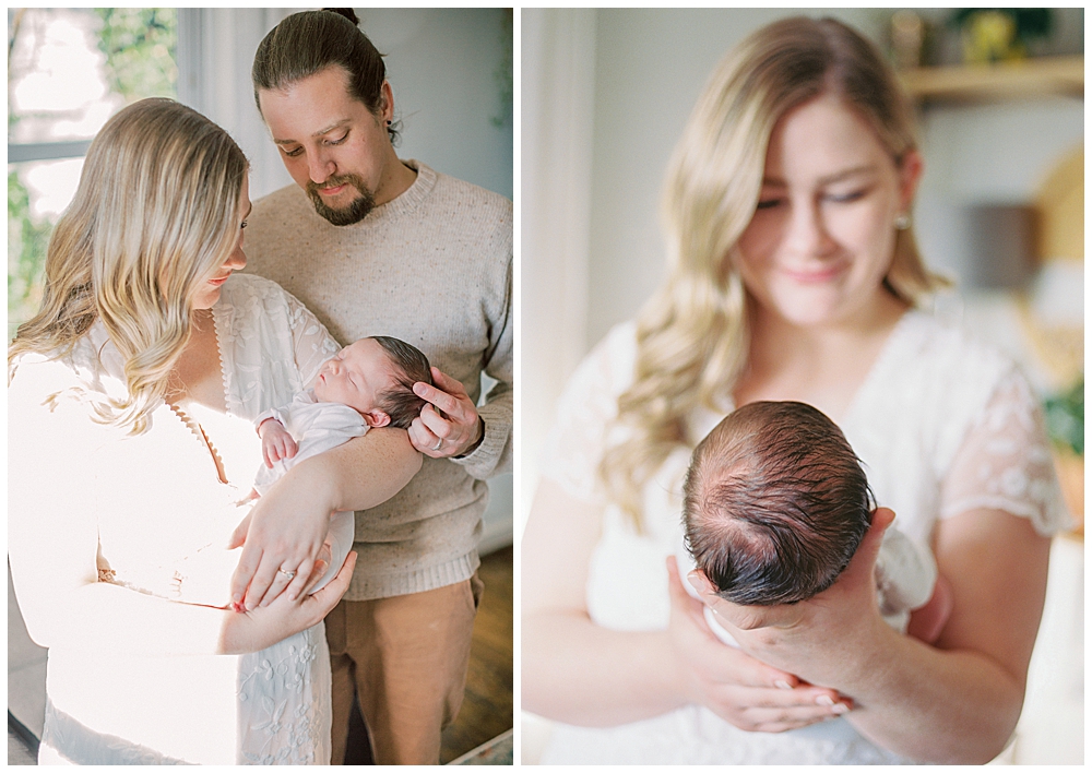An Arlington newborn session with mother and father holding their newborn daughter