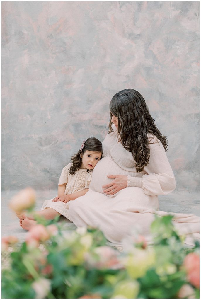 Maternity studio session with daughter and mother