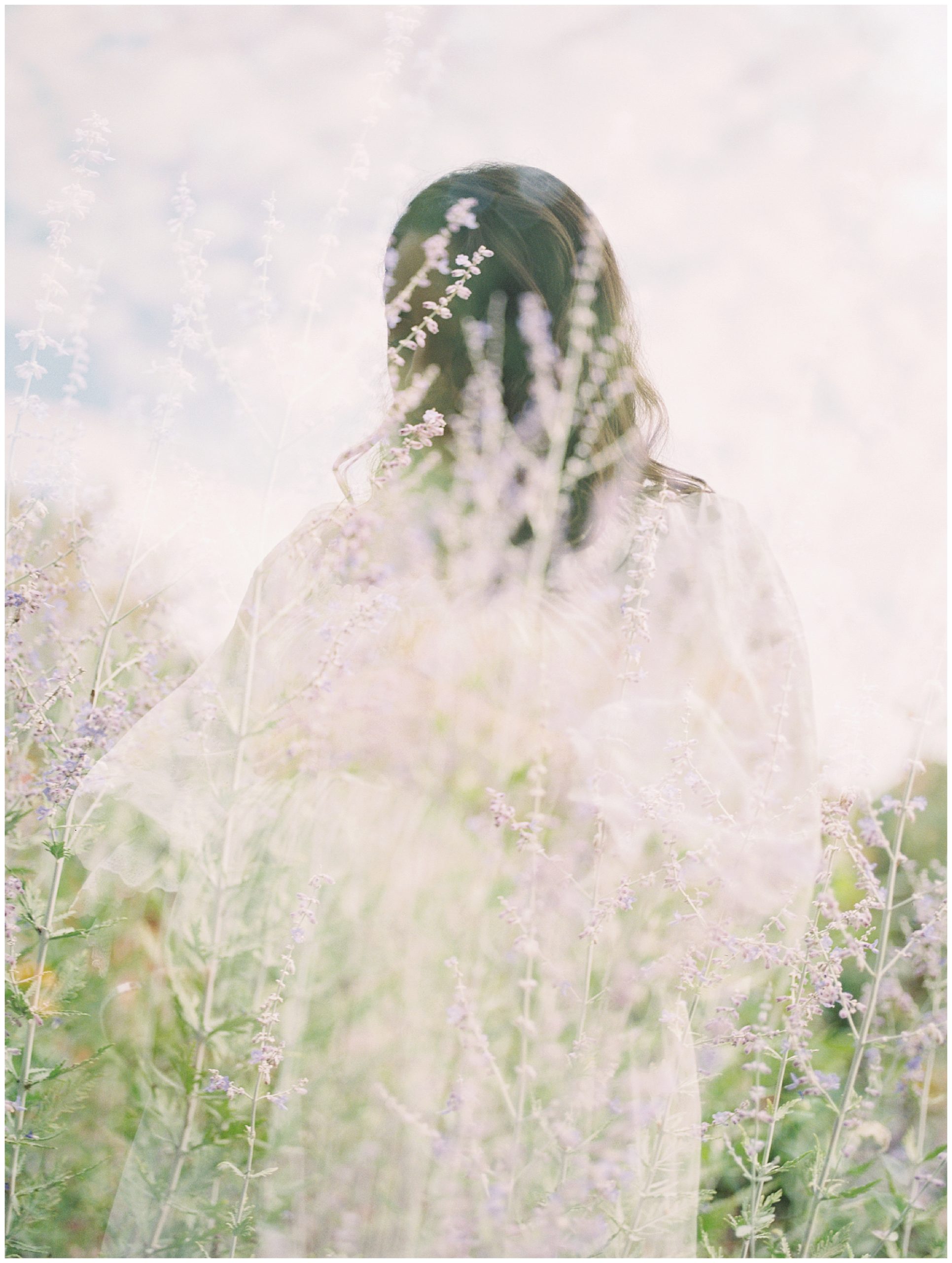 Double exposure of pregnant mother and purple flowers during floral maternity session.